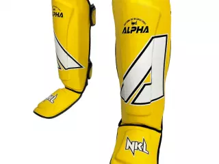 ESPINILLERAS  ALPHA NEGRO/BLANCO-amarillo-gris-azul