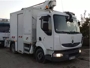 RENAULT MIDLUM 180 DXI CON CESTA PORTA PERSONAS.
